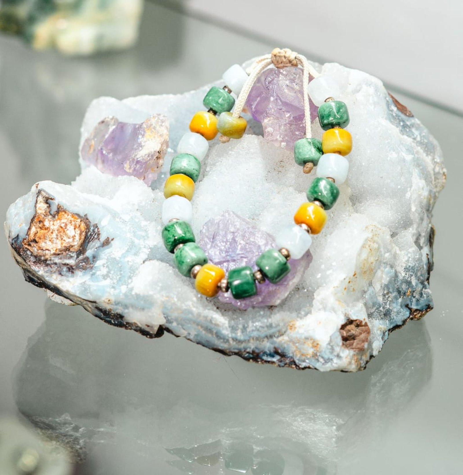 Real Guatemalan jade bracelet resting on a crystal — delivered in Flushing, Queens